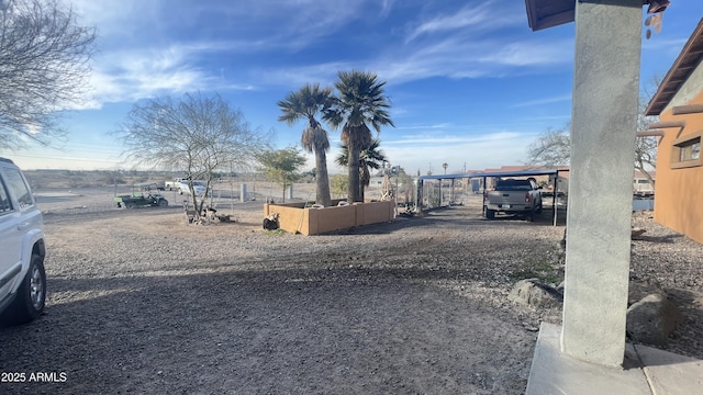 view of yard featuring a carport