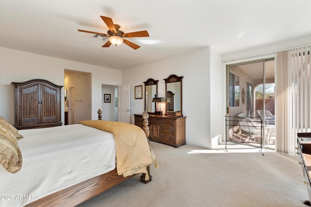 carpeted bedroom featuring access to exterior, visible vents, and a ceiling fan