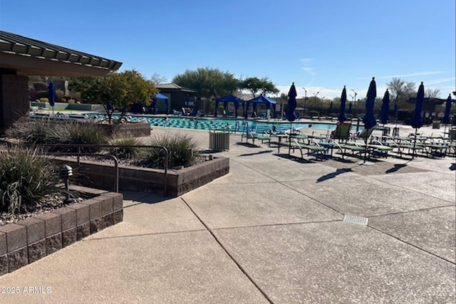 pool featuring a patio