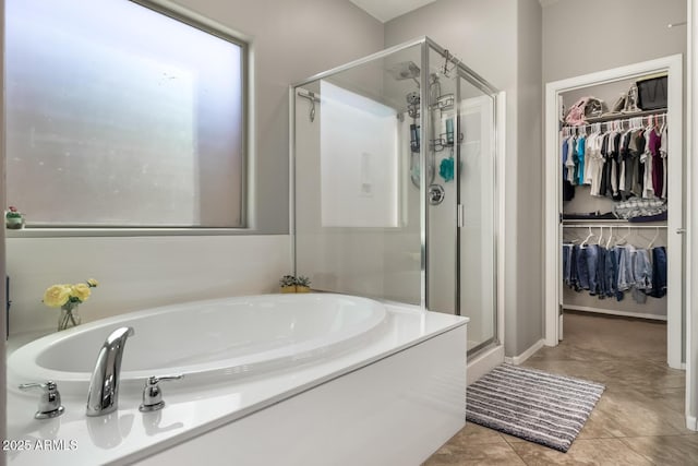 10840 W Saddlehorn Rd, Peoria, AZ 85383 - bathroom featuring plus walk in shower and tile patterned flooring