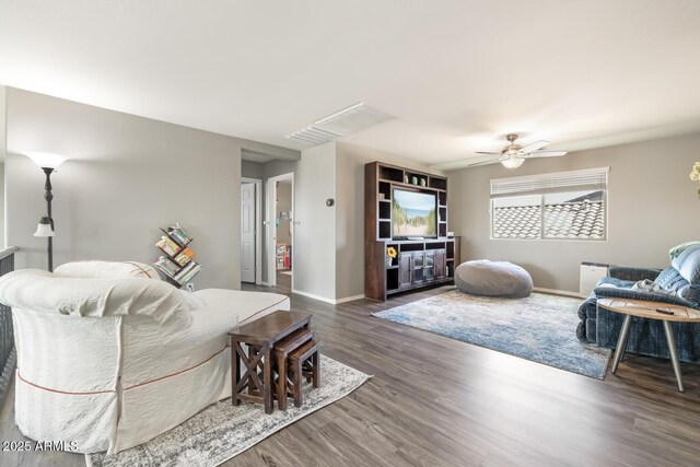 10840 W Saddlehorn Rd, Peoria, AZ 85383 - living room with dark hardwood / wood-style flooring and ceiling fan