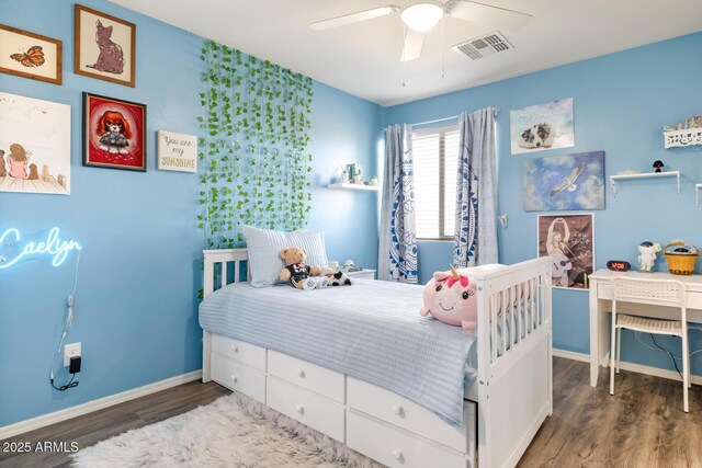 10840 W Saddlehorn Rd, Peoria, AZ 85383 - bedroom with dark wood-type flooring and ceiling fan