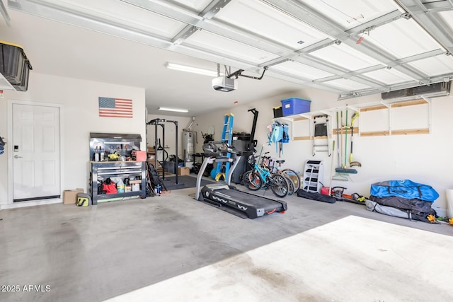 10840 W Saddlehorn Rd, Peoria, AZ 85383 - garage featuring a garage door opener and water heater