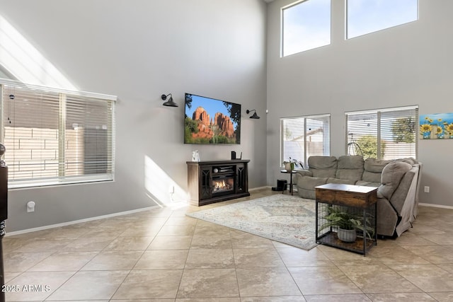 10840 W Saddlehorn Rd, Peoria, AZ 85383 - tiled living room with a wealth of natural light