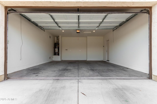 14355 W Valentine St, Surprise, AZ 85379 - garage with a garage door opener and secured water heater