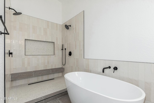 5736 E Singletree St, Apache Junction, AZ 85119 - full bath with walk in shower, tile walls, and a freestanding tub