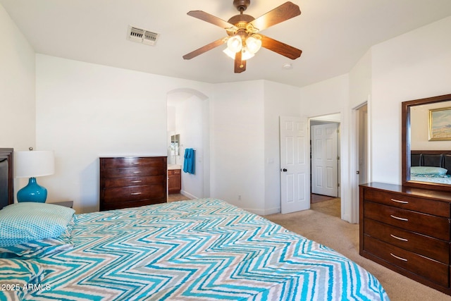 carpeted bedroom featuring ceiling fan