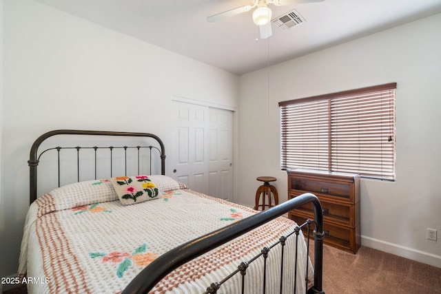 bedroom featuring carpet, a closet, and ceiling fan