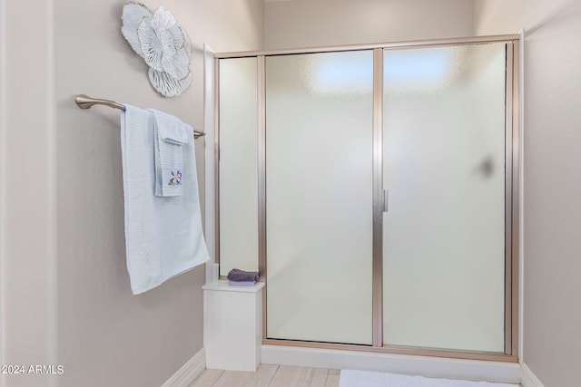 bathroom featuring an enclosed shower