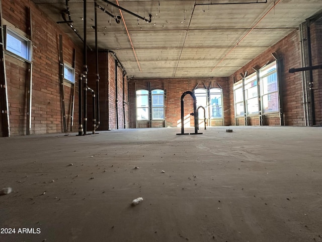 miscellaneous room with brick wall