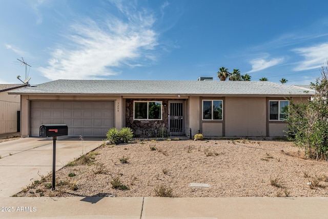 3208 W Wagoner Rd, Phoenix, AZ 85053 - single story home with driveway and an attached garage