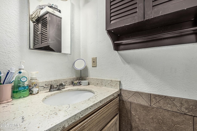 3208 W Wagoner Rd, Phoenix, AZ 85053 - bathroom featuring vanity and a textured wall