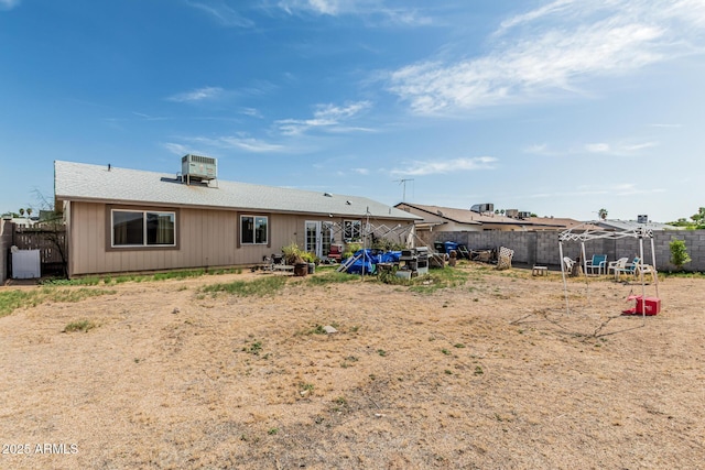 3208 W Wagoner Rd, Phoenix, AZ 85053 - rear view of property featuring a fenced backyard and roof with shingles