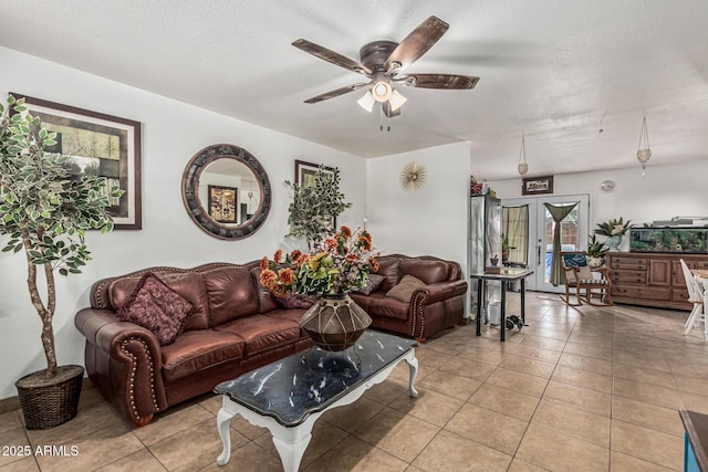 3208 W Wagoner Rd, Phoenix, AZ 85053 - living room with ceiling fan, light tile patterned flooring, and a textured ceiling