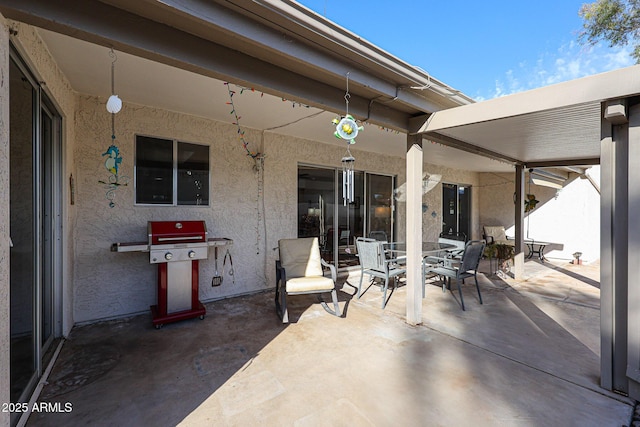 view of patio / terrace featuring outdoor dining space and area for grilling