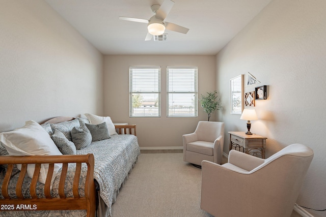 bedroom featuring carpet flooring, baseboards, visible vents, and a ceiling fan