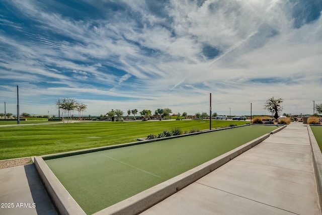 view of home's community featuring a lawn