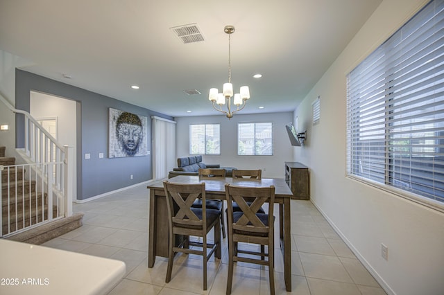 5621 W Chuck Box Rd, Laveen, AZ 85339 - dining area with stairway, a chandelier, light tile patterned floors, and recessed lighting