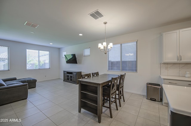 5621 W Chuck Box Rd, Laveen, AZ 85339 - dining area with a chandelier, light tile patterned floors, and recessed lighting