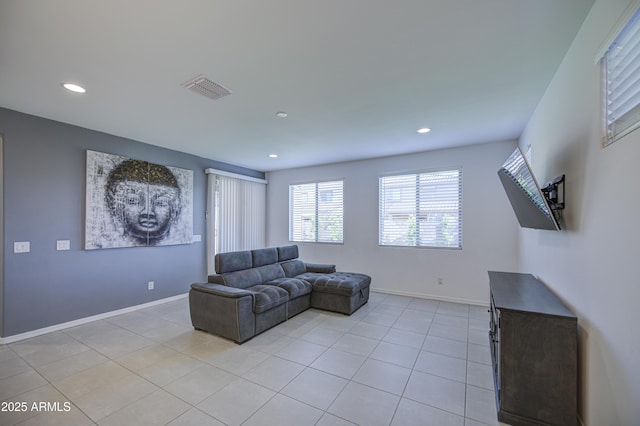 5621 W Chuck Box Rd, Laveen, AZ 85339 - living room with light tile patterned floors and recessed lighting