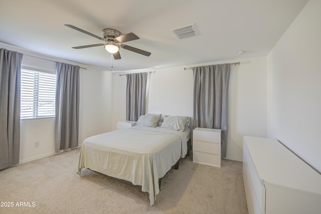 5621 W Chuck Box Rd, Laveen, AZ 85339 - bedroom featuring light colored carpet and ceiling fan