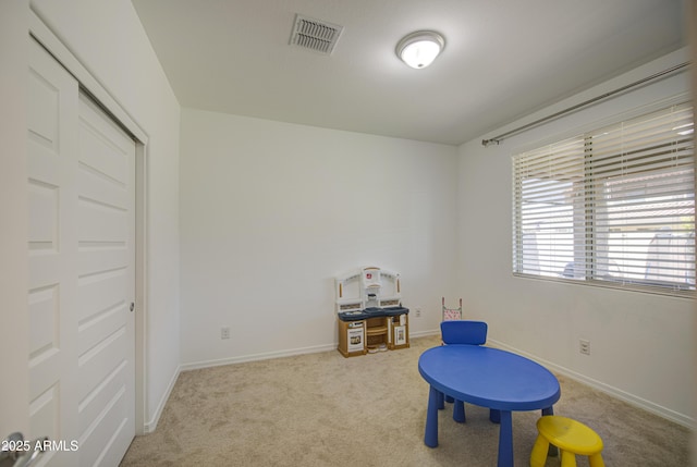 5621 W Chuck Box Rd, Laveen, AZ 85339 - recreation room with carpet and baseboards