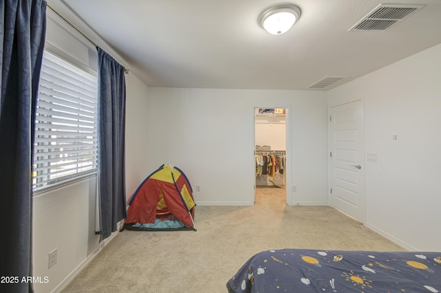 5621 W Chuck Box Rd, Laveen, AZ 85339 - bedroom featuring carpet flooring and a walk in closet