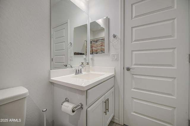 5621 W Chuck Box Rd, Laveen, AZ 85339 - bathroom with vanity and toilet
