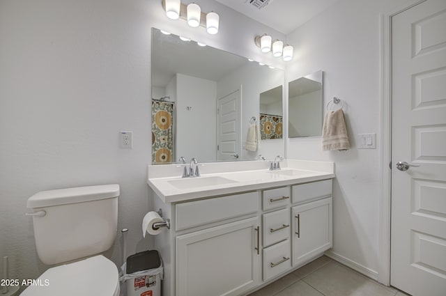 5621 W Chuck Box Rd, Laveen, AZ 85339 - bathroom with double vanity and tile patterned floors