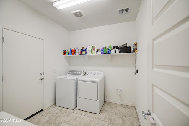 5621 W Chuck Box Rd, Laveen, AZ 85339 - laundry area featuring washing machine and dryer and baseboards