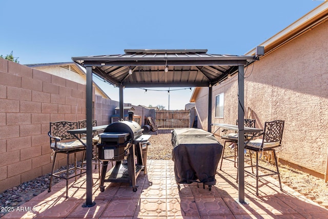 view of patio with a gazebo and grilling area