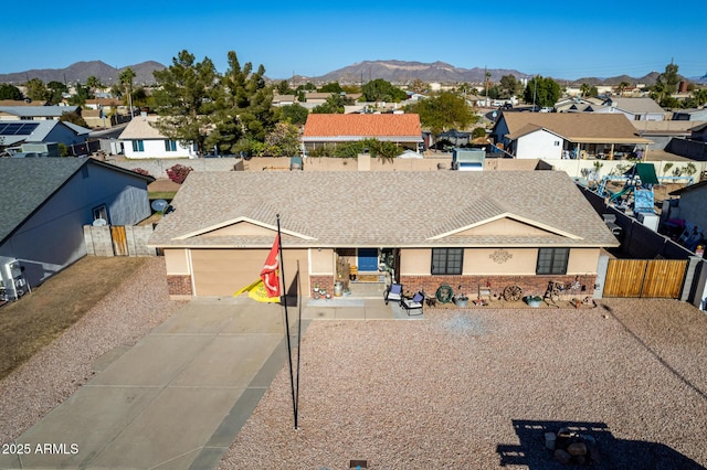 drone / aerial view featuring a mountain view