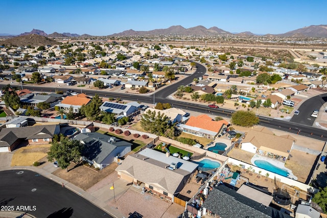 bird's eye view with a mountain view