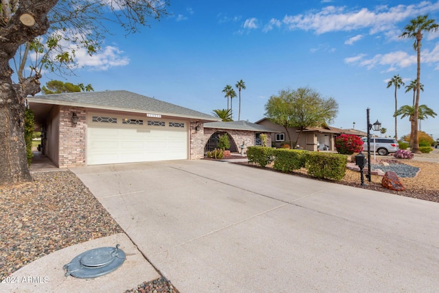 ranch-style house with a garage