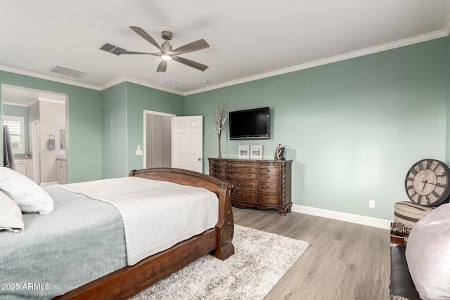 1179 E Regent Dr, Gilbert, AZ 85298 - bedroom with light wood-type flooring, crown molding, baseboards, ensuite bathroom, and a ceiling fan