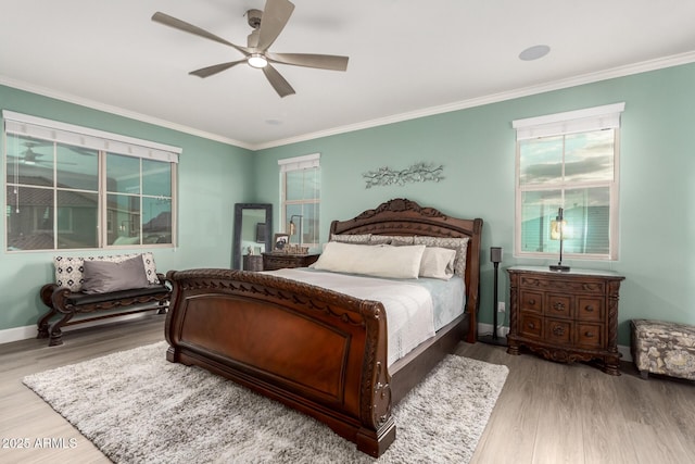 1179 E Regent Dr, Gilbert, AZ 85298 - bedroom with wood finished floors, ornamental molding, baseboards, and ceiling fan