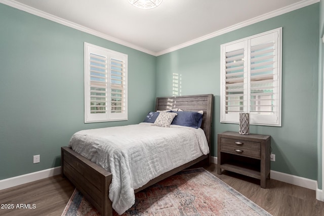 1179 E Regent Dr, Gilbert, AZ 85298 - bedroom featuring baseboards, wood finished floors, crown molding, and multiple windows