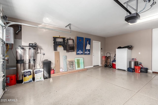 1179 E Regent Dr, Gilbert, AZ 85298 - garage featuring a garage door opener and baseboards