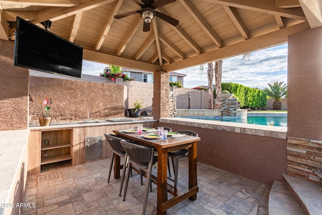 1179 E Regent Dr, Gilbert, AZ 85298 - view of patio featuring an outdoor kitchen, ceiling fan, a fenced backyard, a sink, and a gazebo