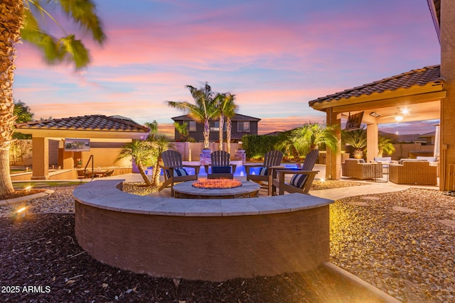 1179 E Regent Dr, Gilbert, AZ 85298 - view of patio with an outdoor living space with a fire pit