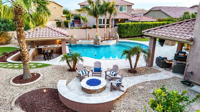 1179 E Regent Dr, Gilbert, AZ 85298 - view of pool with a gazebo, an outdoor fire pit, a fenced backyard, a patio, and a pool with connected hot tub