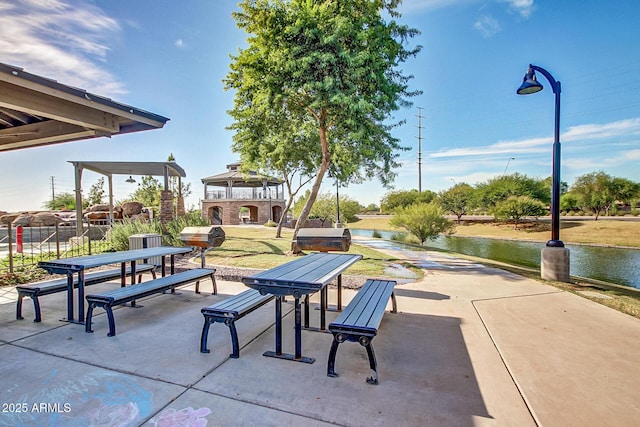 1179 E Regent Dr, Gilbert, AZ 85298 - view of community with a gazebo, a patio area, outdoor dining space, a water view, and a yard