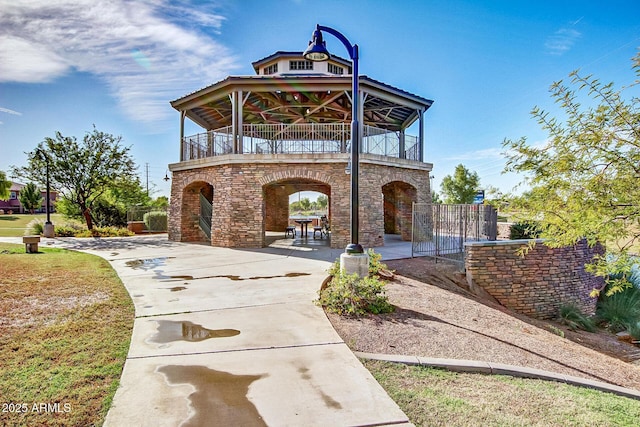 1179 E Regent Dr, Gilbert, AZ 85298 - view of front of house featuring stone siding and fence