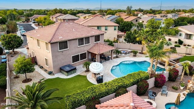 1179 E Regent Dr, Gilbert, AZ 85298 - view of pool with a jacuzzi, a fenced backyard, a residential view, and a pergola