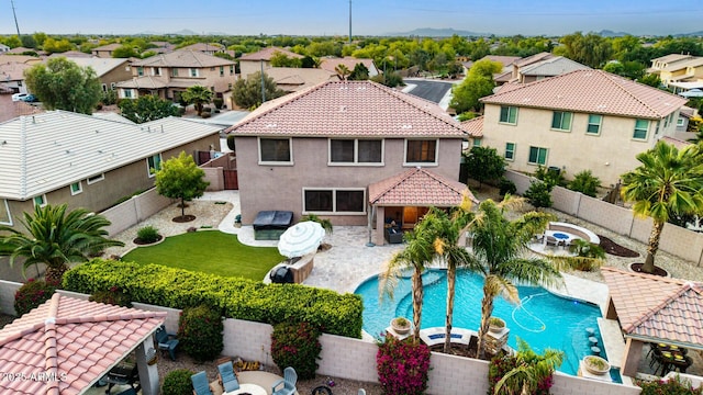 1179 E Regent Dr, Gilbert, AZ 85298 - view of pool with a fenced backyard, a residential view, a patio, area for grilling, and a hot tub