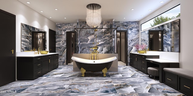 bathroom featuring vanity, a washtub, and tile walls