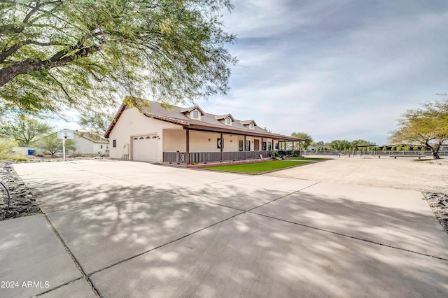 view of side of home featuring a garage