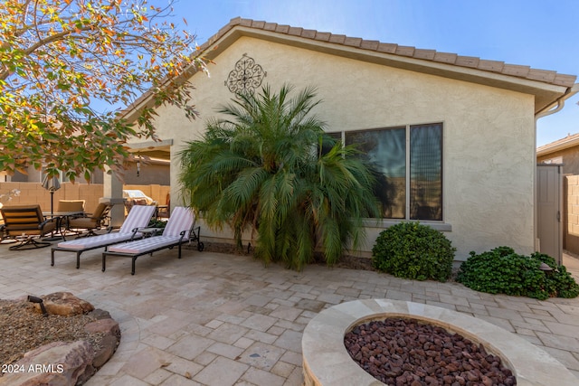 exterior space featuring a fire pit