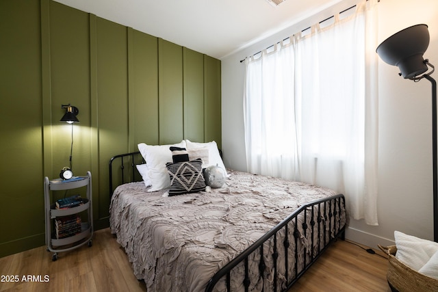 bedroom featuring light wood-type flooring