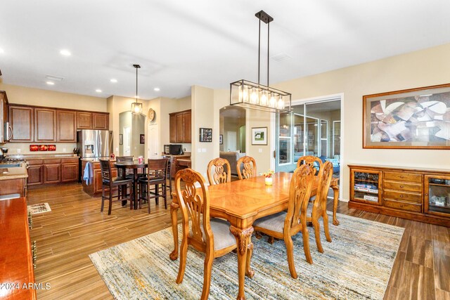 dining area with light hardwood / wood-style flooring